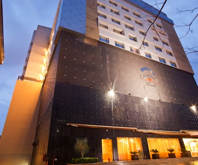 https://imgcld.yatra.com/ytimages/image/upload/t_hotel_yatra_city_desktop/v1390499956/Domestic Hotels/Hotels_Ahmedabad/Hotel Cambay Grand/Facade2~34.jpg